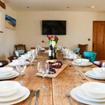 large table with room for 14 people